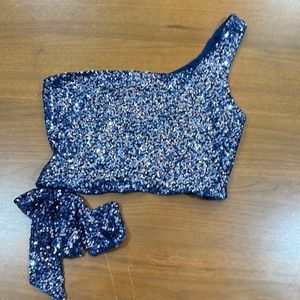 Blue sequined top.